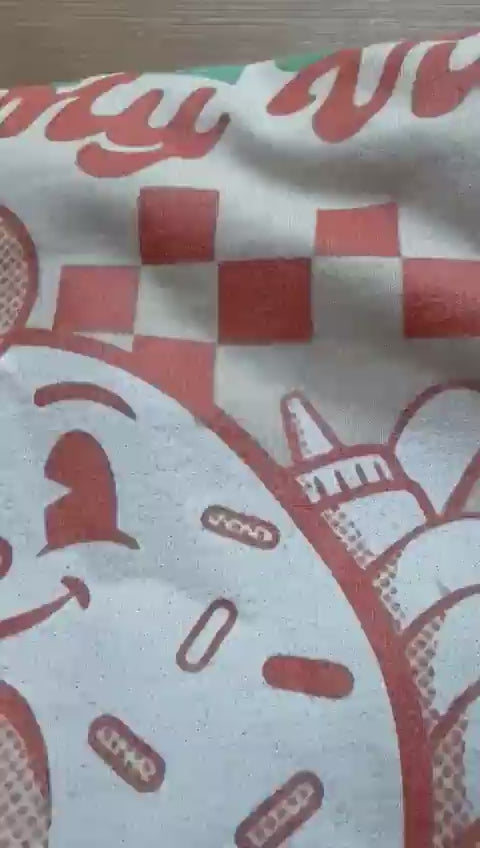 Lifestyle video of a model wearing a Yum Stitch oversized vintage graphic t-shirt, demonstrating the relaxed street-style fit and drape of the 7.5 oz ringspun cotton.