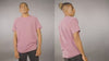 Close-up video of Comfort Colors 1717 heavyweight cotton fabric in charcoal grey, showing the soft garment-dyed texture and durable stitching for a vintage graphic t-shirt.